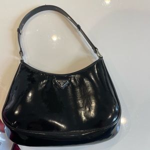 - Black patent leather bag